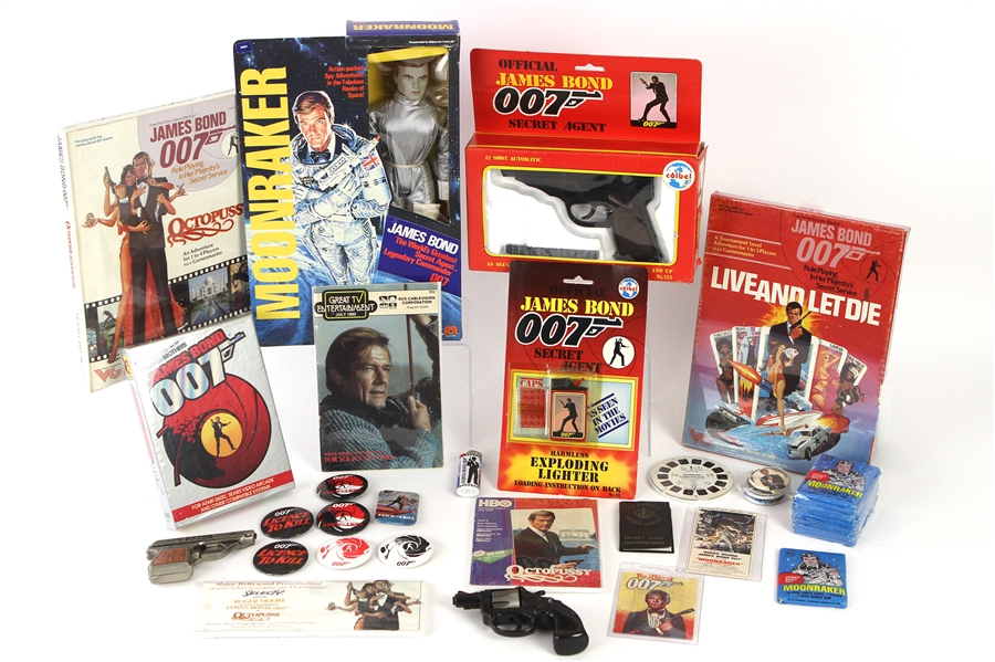 1970s-80s James Bond Memorabilia Collection - Lot of 48 w/ Posters, MIB Moonraker Mego Action Figure, Publications, Unopened Moonraker Trading Cards & Moire
