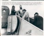 1960 Vince Lombardi Boarding Plane For Championship Game Type 1 8" x 10" Photo - SPORT Magazine 