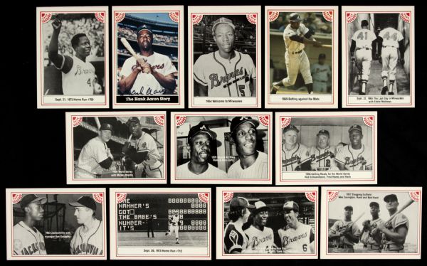 1983 Milwaukee Braves Hank Aaron & Warren Spahn Story Sets - Both With Certified Autographed Cards & Spahn Signed Harley Davidson Card - JSA