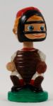 1960s Catcher Green Oval Base Bobbing Head Doll Bank