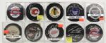 Collecton of Signed NHL Pucks - 63 With 17 Hall of Famers - (MEARS LOA) 