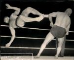 1950 Tony "Argentine" Rocca vs. Ali Baba Wrestlers "The Sporting News Collection Archives" Original 8" x 10.25" Photo (Sporting News Collection Hologram/MEARS Photo LOA)