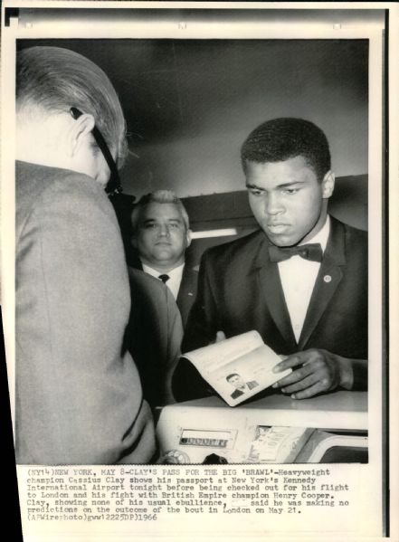 1966 Muhammad Ali Flashes Passport en Route to London "Chicago Sun-Times Archives" Original 8" x 11" Photo (Chicago Sun-Times Hologram/MEARS Photo LOA)