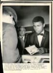 1966 Muhammad Ali Flashes Passport en Route to London "Chicago Sun-Times Archives" Original 8" x 11" Photo (Chicago Sun-Times Hologram/MEARS Photo LOA)