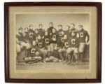 1900 circa Autographed Oversized Unidentified “C” Football Team 10”x14” Cabinet Type 1 Original Photo on Mount – Pach Bros – Turtle Neck Sweater, Quilted Pants, Melon Football (MEARS LOA)