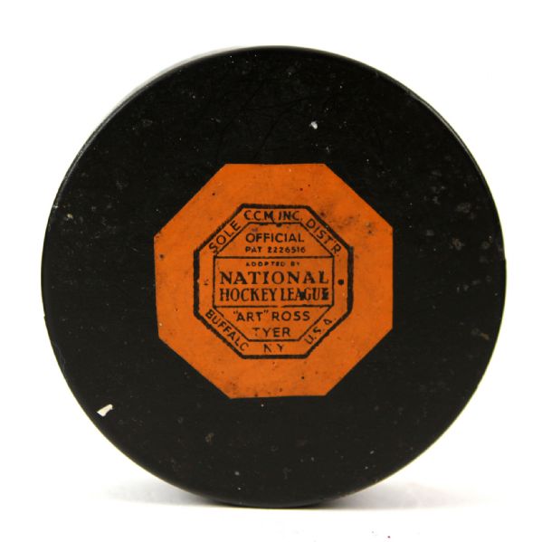 1957 New York Rangers vs. Chicago Blackhawks Madison Square Garden Ticket Stub & Game Used Hockey Puck (MEARS LOA)