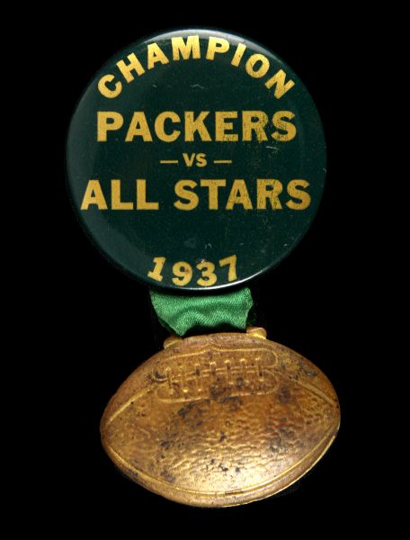 1937 Marquee Lettered Champion Green Bay Packers vs. College All Stars 1 ¾” Celluloid Pinback Button W/ Pressed Metal Relief Football Hanger (Paul Muchinsky Collection) 