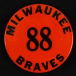 1953-65 Extremely Rare Milwaukee Braves Black On Orange Employee “88” Concessionaires  2 ¼” Celluloid Pinback Button (Paul Muchinsky Collection)