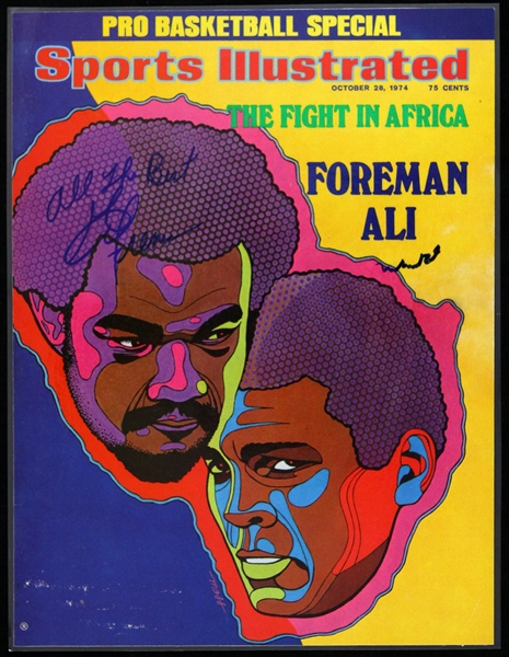 1974 George Foreman Signed Laminated Sports Illustrated Page (JSA)