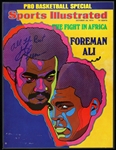 1974 George Foreman Signed Laminated Sports Illustrated Page (JSA)