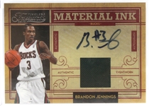 2011 (February 14) Brandon Jennings Milwaukee Bucks Signed Game Worn Under Armour Sneakers & Panini Material Ink Trading Card (MEARS LOA/JSA)
