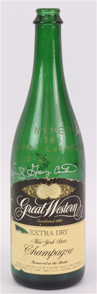 1986 New York Mets Multi Signed Champagne Bottle From World Series Locker Room Celebration w/ 8 Signatures Including Gary Carter, Darry Strawberry, Ray Knight & More (MEARS LOA/JSA/Mets Employee LOA)