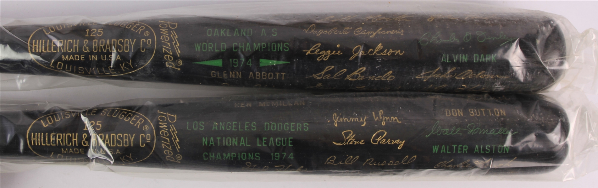 1974 Oakland Athletics Los Angeles Dodgers World / National League Champions H&B Louisville Slugger Commemorative Black Bats - Lot of 2 (MEARS LOA)