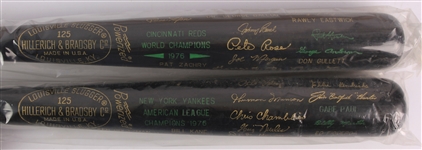 1976 Cincinnati Reds New York Yankees World / American League Champion H&B Louisville Slugger Commemorative Black Bats - Lot of 2 (MEARS LOA)