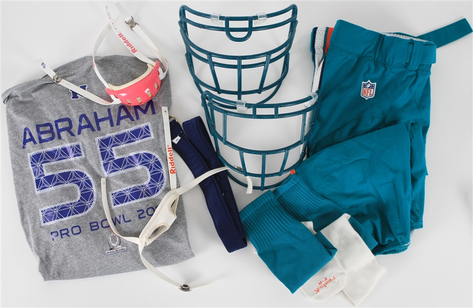 2010s Miami Dolphins Uniform Elements Collection - Lot of 8 w/ Facemasks, Chin Guards, Pants, Socks & More (MEARS LOA)