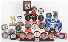 1980s-2000s Hockey Puck Collection - Lot of 24 w/ Gordie Howe, Detroit Red Wings, New England Whalers & More