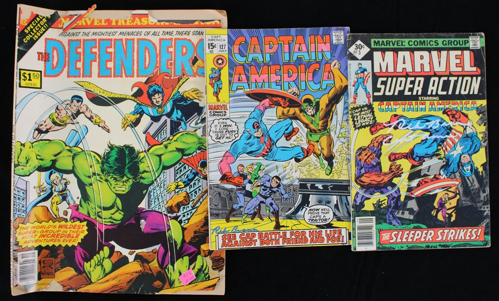 1970-1978 Reb Brown Capt America Signed Comic Books and Marvel The Defenders Comic Book (Lot of 3) (JSA)