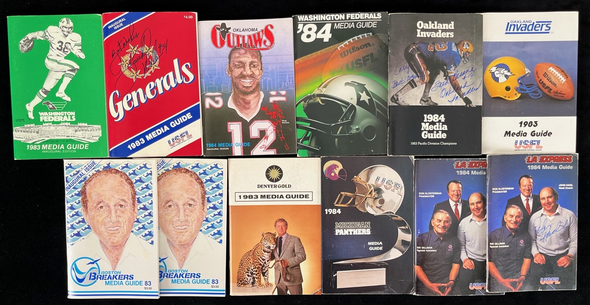 1983-84 USFL Media Guide Collection - Lot of 12 w/ 3 Signed Including Herschel Walker, John Hadl & Fred Basana