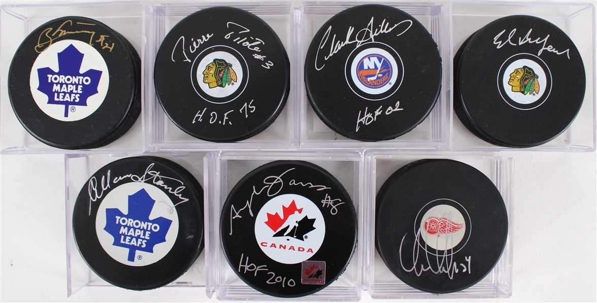 1980s-2000s Signed Hockey Puck Collection - Lot of 16 w/ Ed Balfour, Chris Chelios, Bobby Hull, Pierre Pilote & More (JSA)