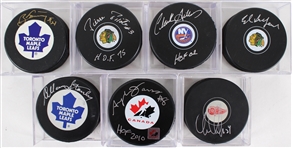 1980s-2000s Signed Hockey Puck Collection - Lot of 16 w/ Ed Balfour, Chris Chelios, Bobby Hull, Pierre Pilote & More (JSA)