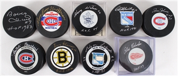 1980's-2000's Signed Hockey Puck Collection - Lot of 16 w/ Ed Balfour, Chris Chelios, Bobby Hull, Pierre Pilote & More (JSA)