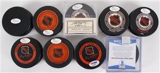 1980's-2000's Signed Hockey Puck Collection - Lot of 16 w/ Ed Balfour, Chris Chelios, Bobby Hull, Pierre Pilote & More (JSA)